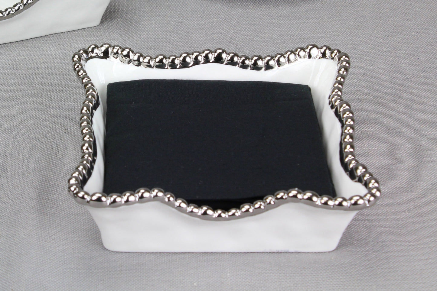 PAMPA BAY LUNCHEON NAPKIN HOLDER IN SILVER