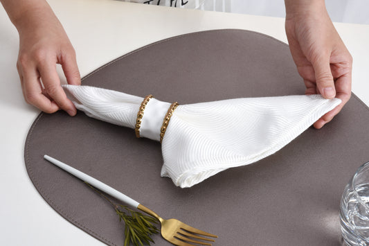 PAMPA BAY NAPKIN RINGS SET OF 4 IN GOLDEN SALERNO